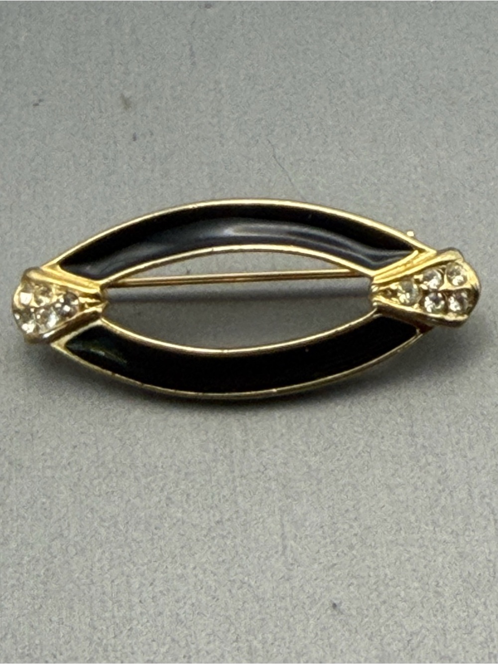 Oval Gold-Tone Black Enamel Brooch with Clear Crystal Accents Vintage